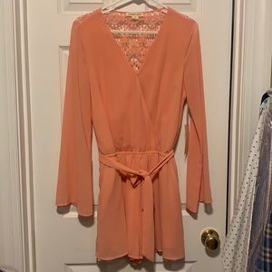 Coral backless long sleeve romper